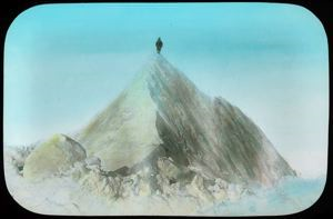 Image of MacMillan Standing on Top of Iceberg